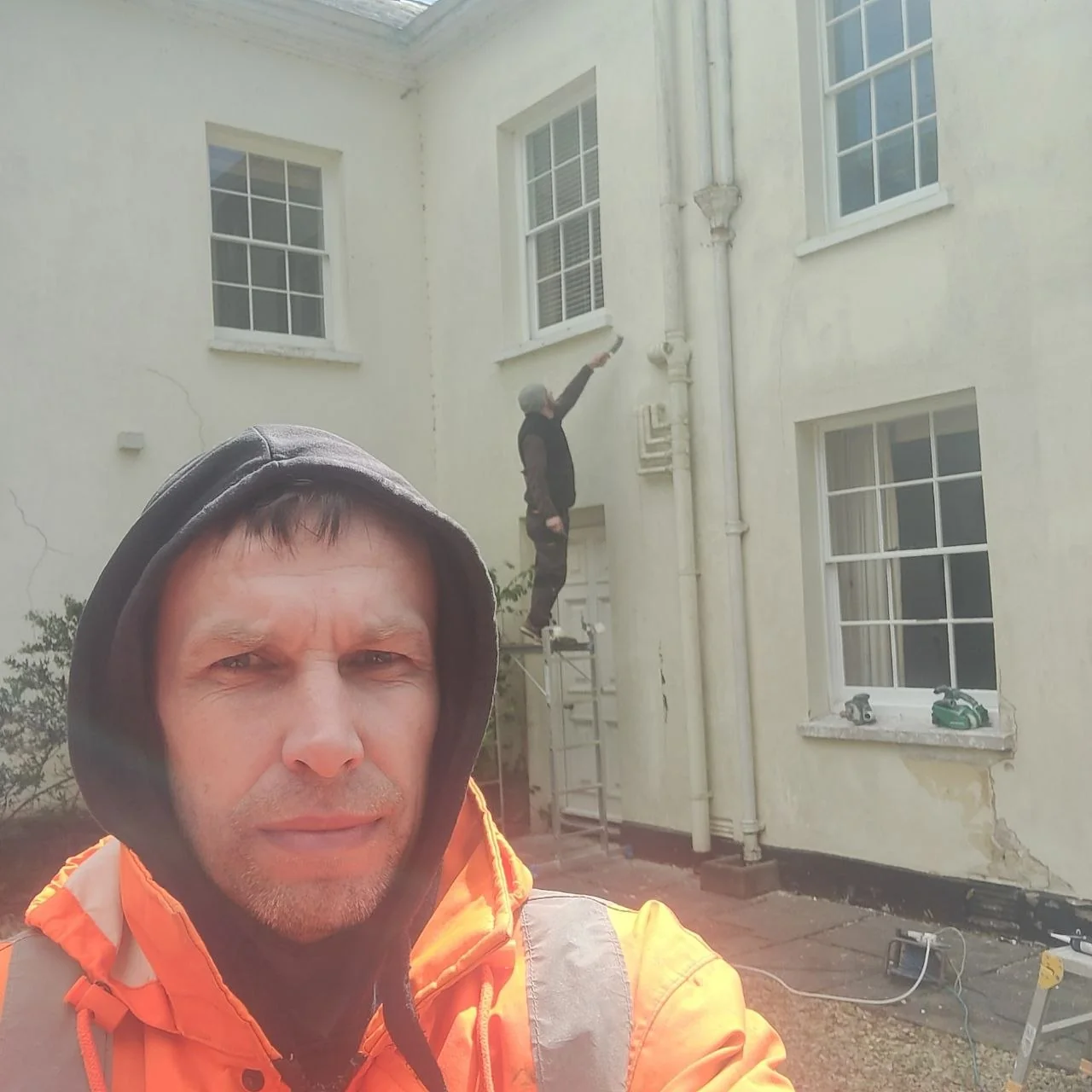 Hands-on exterior preparation work at a residential property